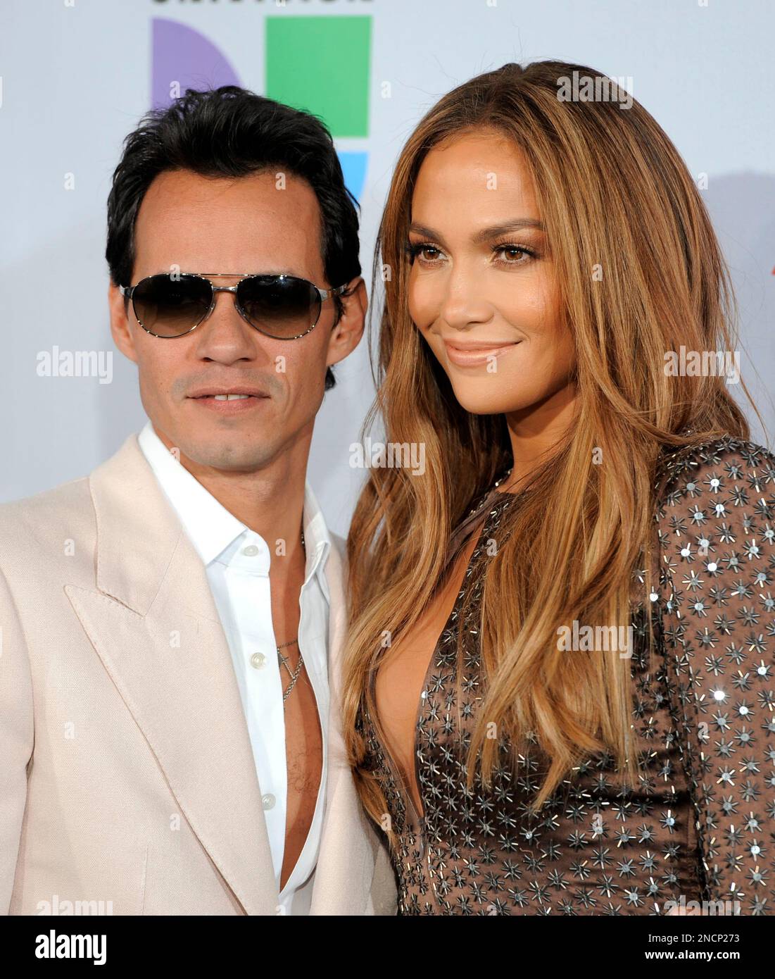 Marc Anthony, left, and Jennifer Lopez arrive at the 11th Annual Latin