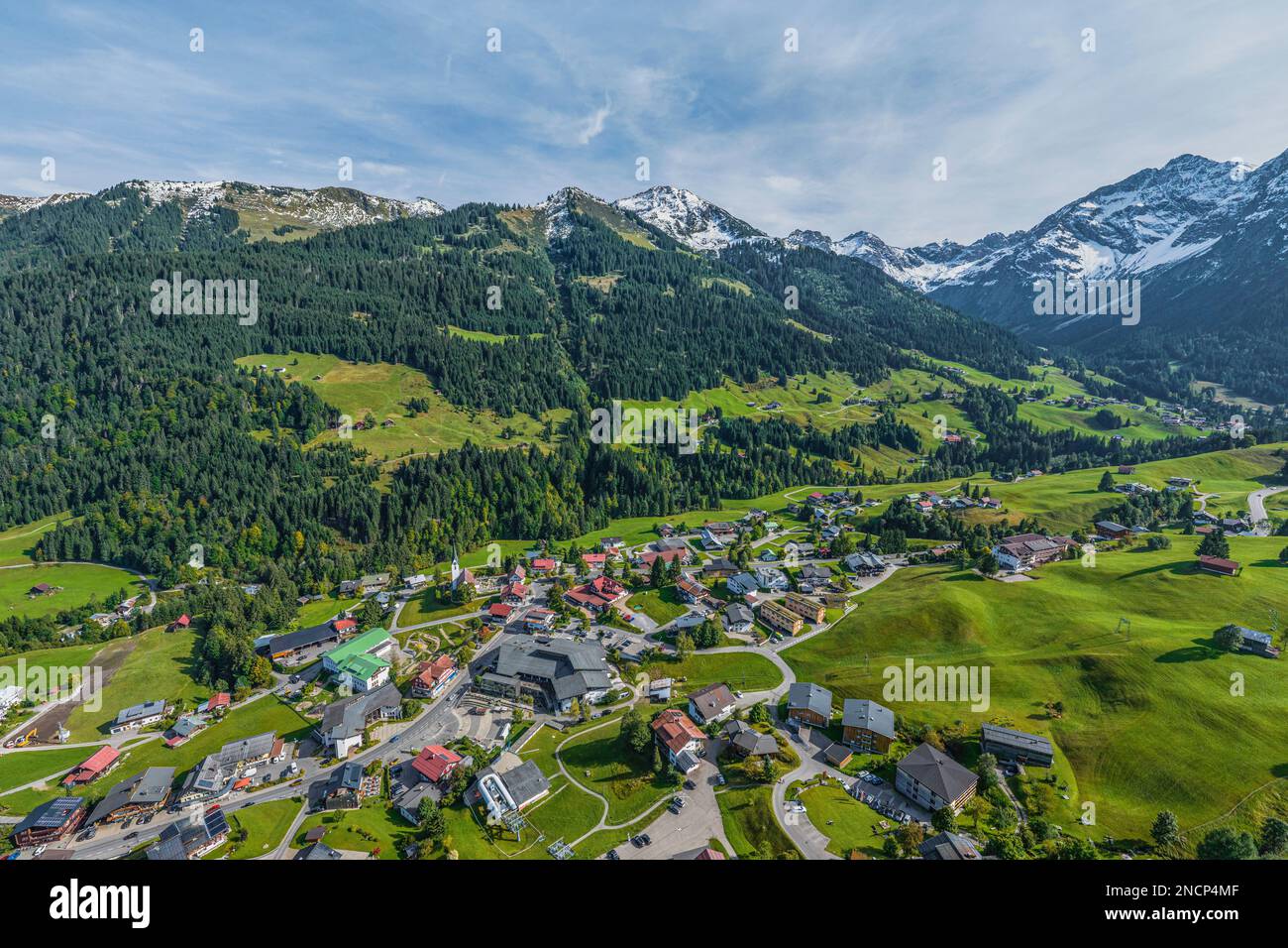 The beautiful Kleinwalsertal near Hirschegg in Vorarlberg in fall from above, first snow on the mountains Stock Photo