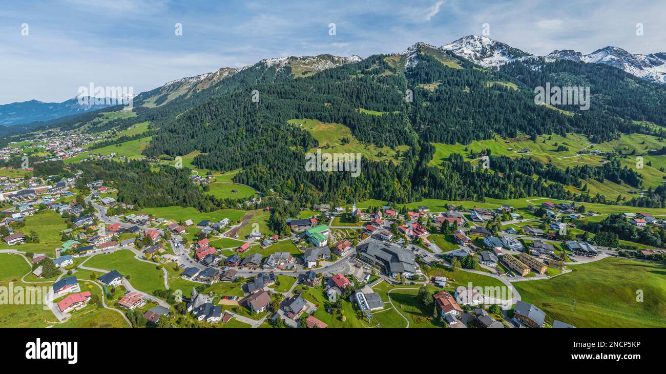 The beautiful Kleinwalsertal near Hirschegg in Vorarlberg in fall from above, first snow on the mountains Stock Photo