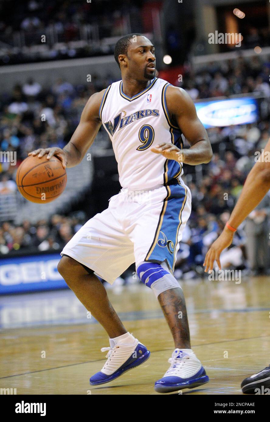 Washington Wizards point guard Gilbert Arenas dribbles the ball against