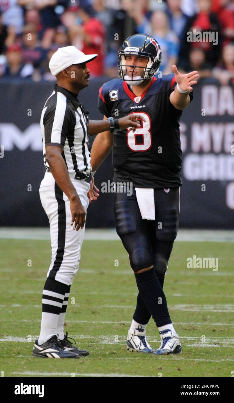 Houston Texans quarterback Matt Schaub and referee Mike Carey in the