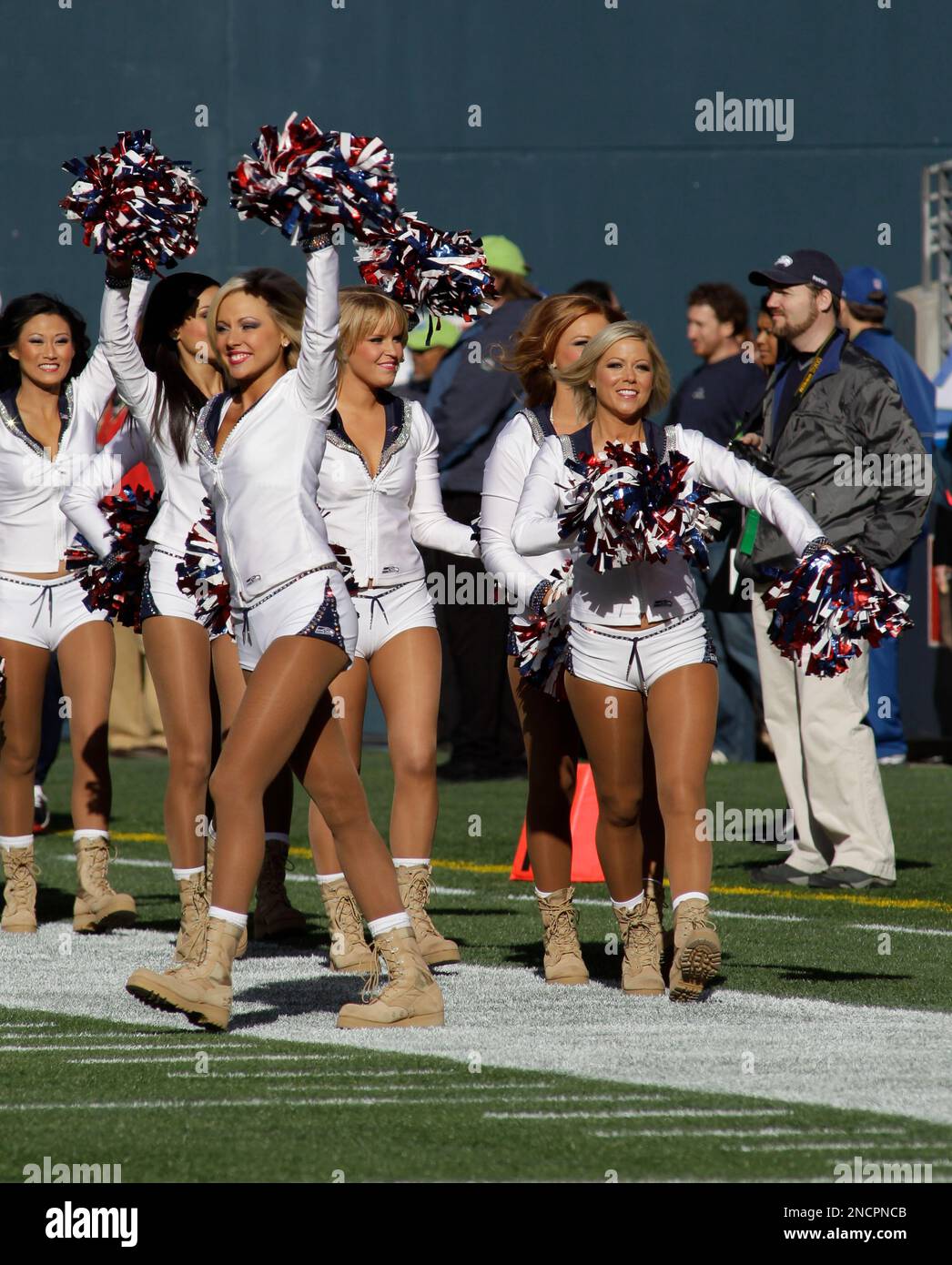 The Sea Gals cheerleades wear combat boots in honor of veterns before the  Seattle Seahawks against the New York Giants NFL football game, Sunday,  Nov. 7, 2010, in Seattle. (AP Photo/Ted S.