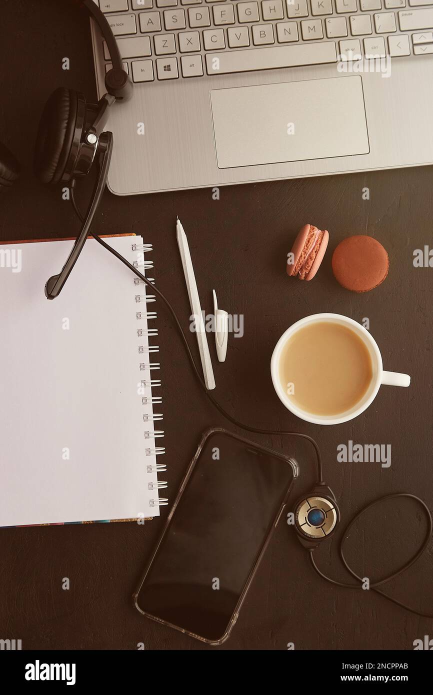 Traditional home office - mock up notebook with pen, laptop, cup of ...