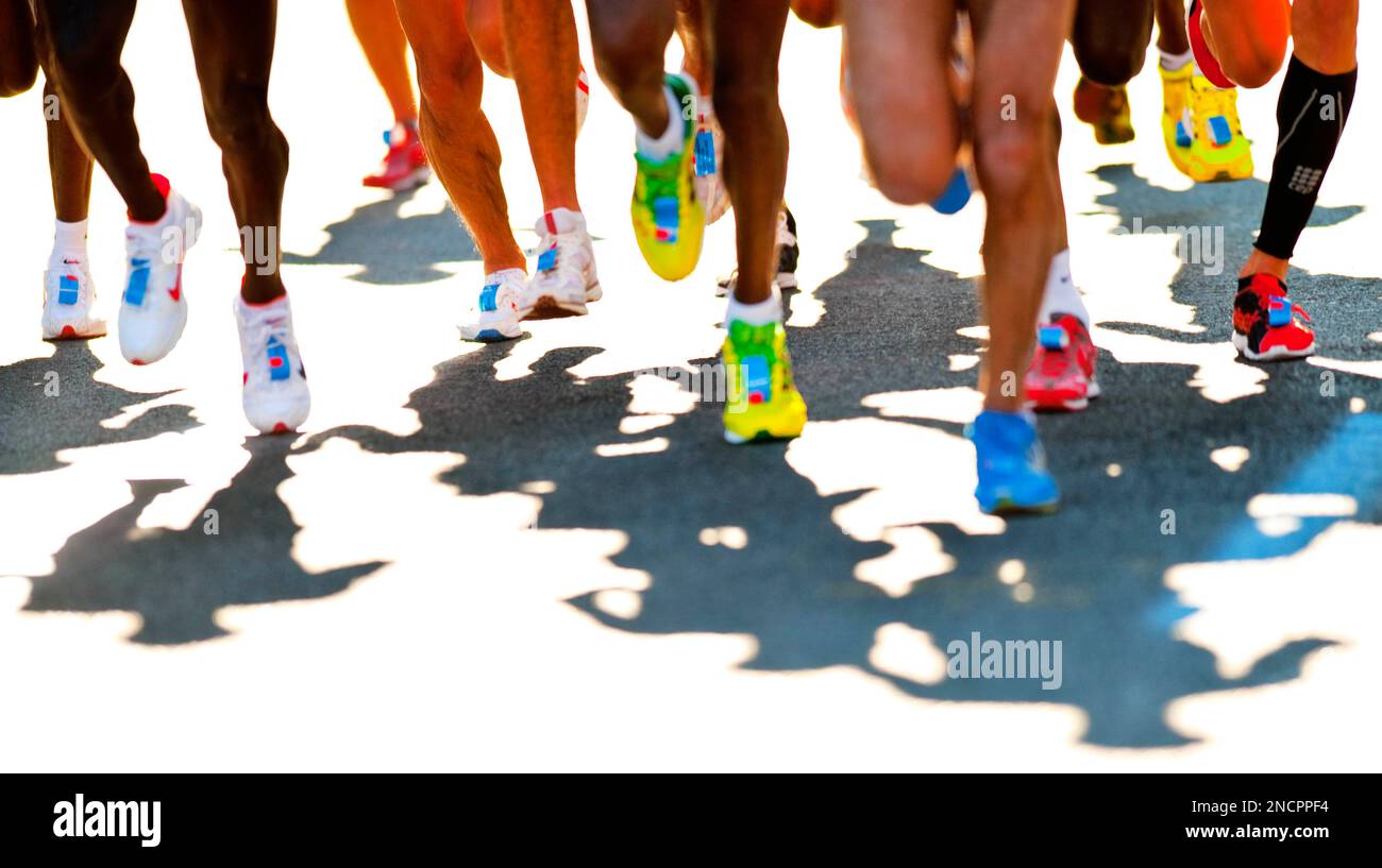 Legs And Shadows Of The Elite Men Are Seen As They Run The New York