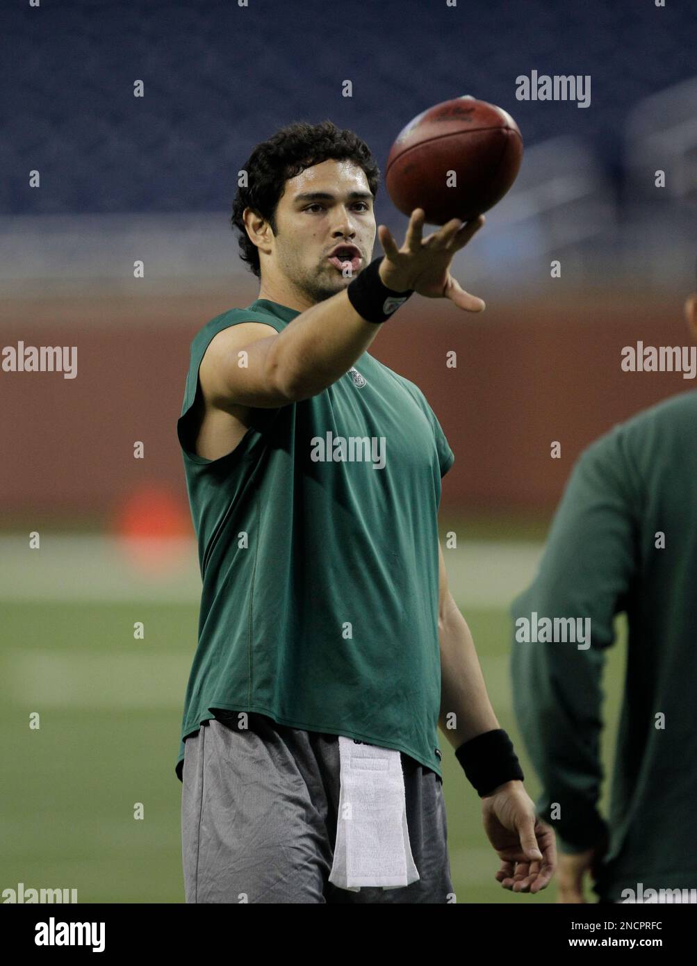 New York Jets quarterback Mark Sanchez balances a ball during pregame