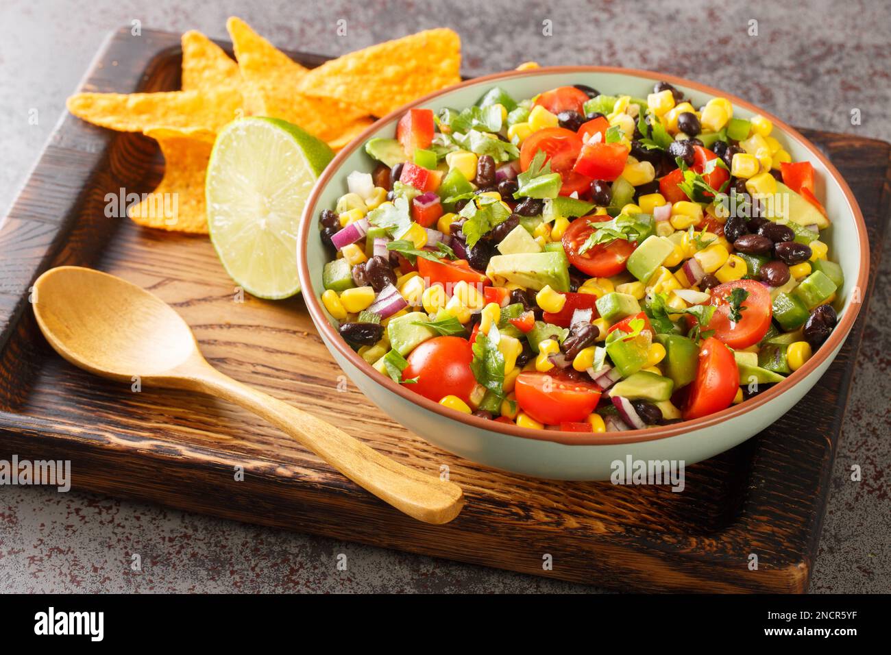 Homemade Cowboy salad or Texas caviar bean dip lime dressing, served ...