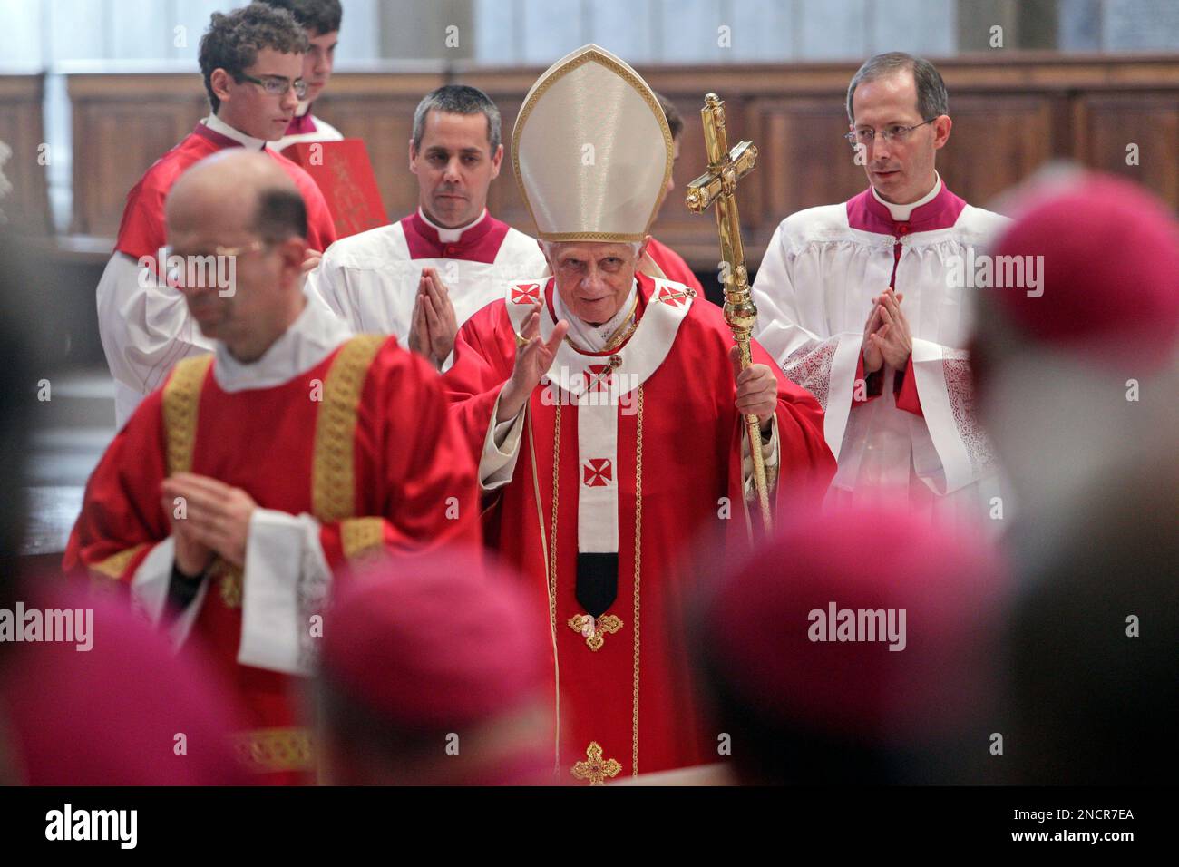 Pope Benedict XVI, center, arrives for a Mass to commemorate cardinals ...