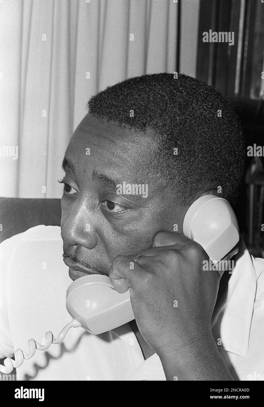 Charles Evers, Mississippi NAACP field director dictates a telegram to