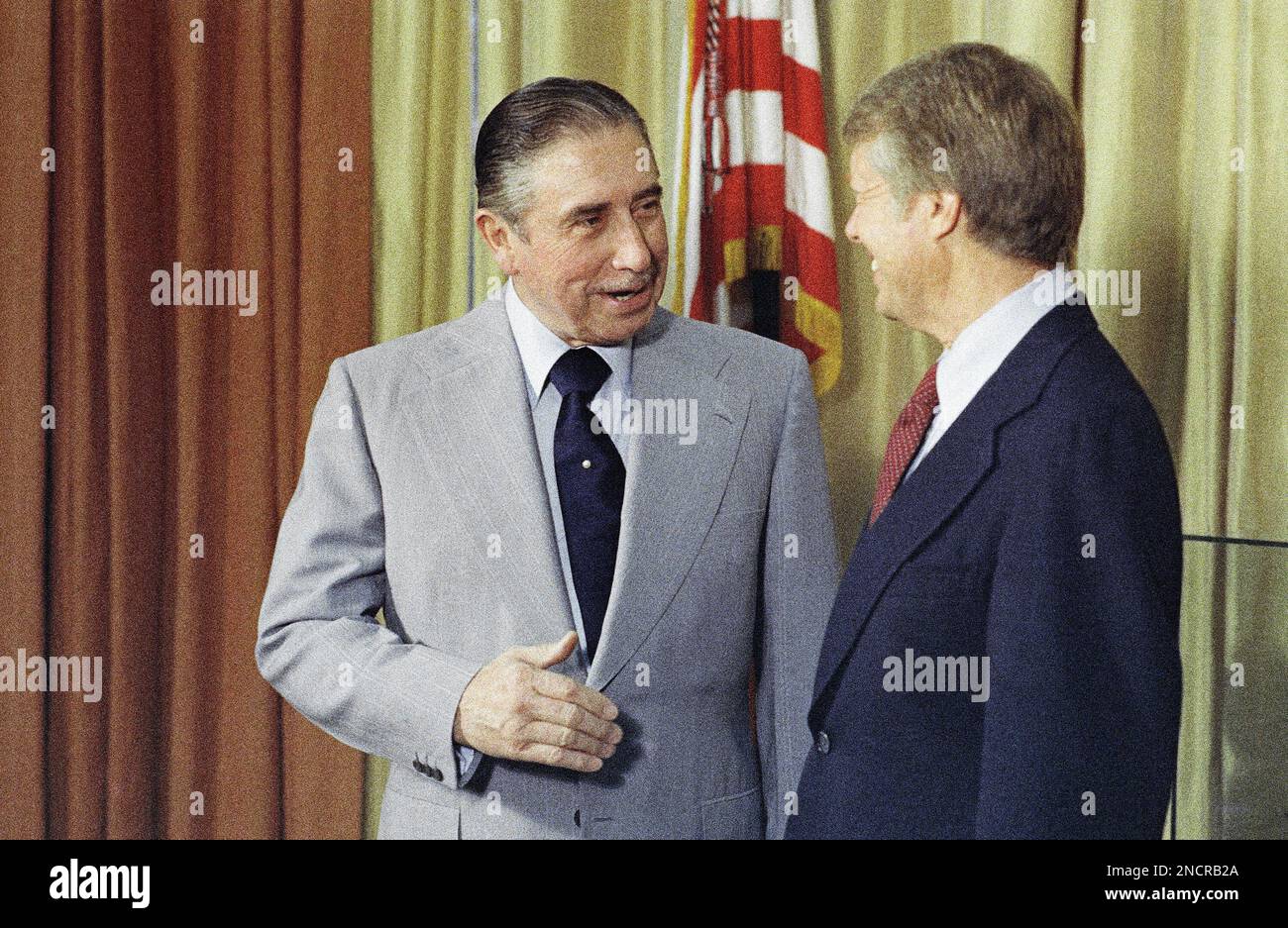 President Jimmy Carter chats with Chile's President Augusto Pinochet
