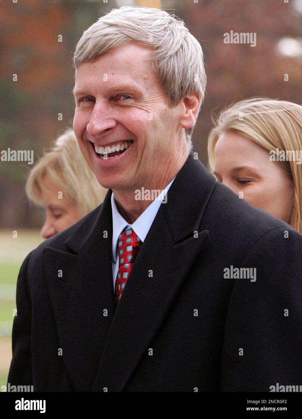 New Hampshire Gov. John Lynch smiles as he arrives to vote, Tuesday