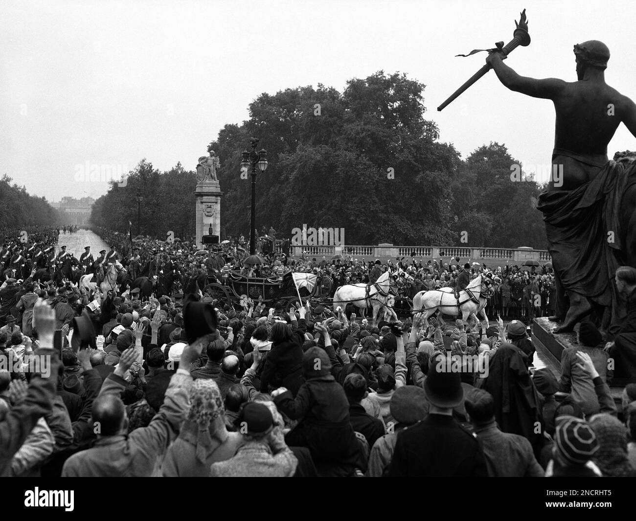 A section of the gigantic crowd which assembled along the length of the ...