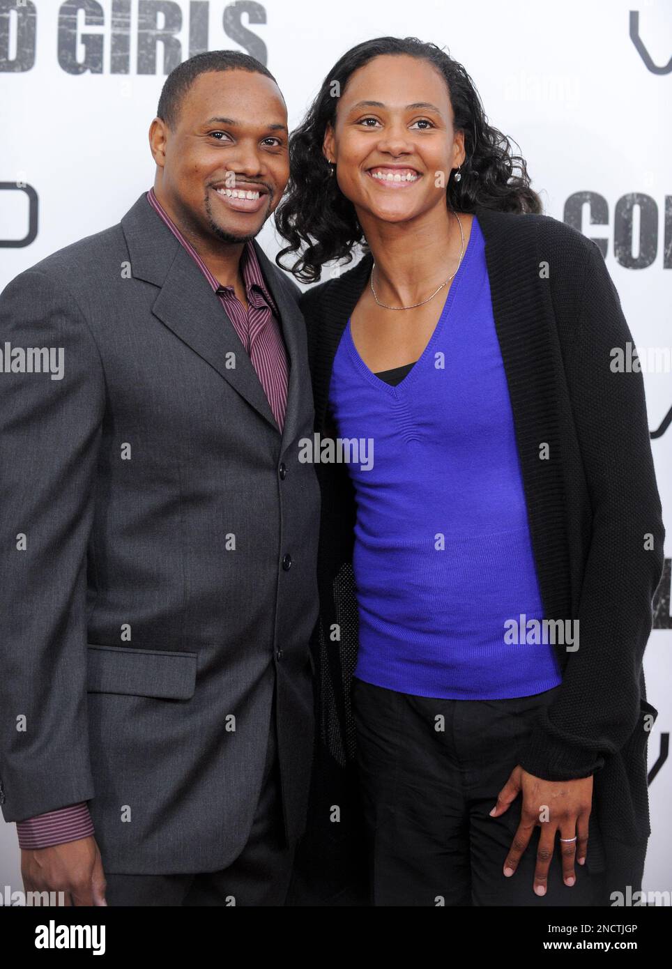 Marion Jones, right, and husband Obadele Thompson attend a special  screening of 'For Colored Girls' at the Ziegfeld Theatre on Monday, Oct.  25, 2010 in New York. (AP Photo/Evan Agostini Stock Photo -