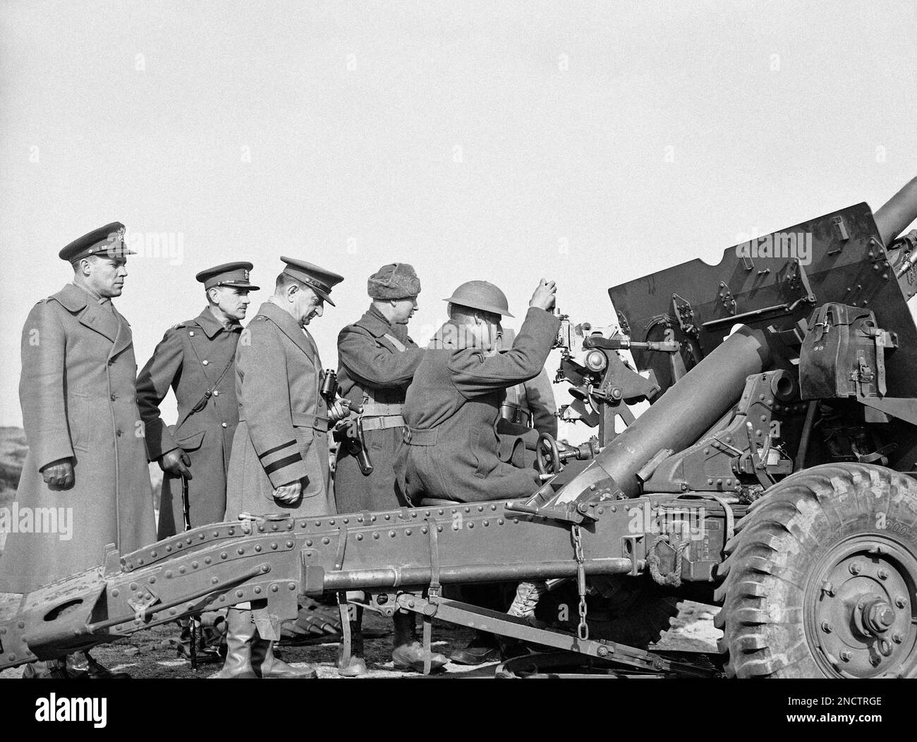 First American troops firing British field artillery guns, after they