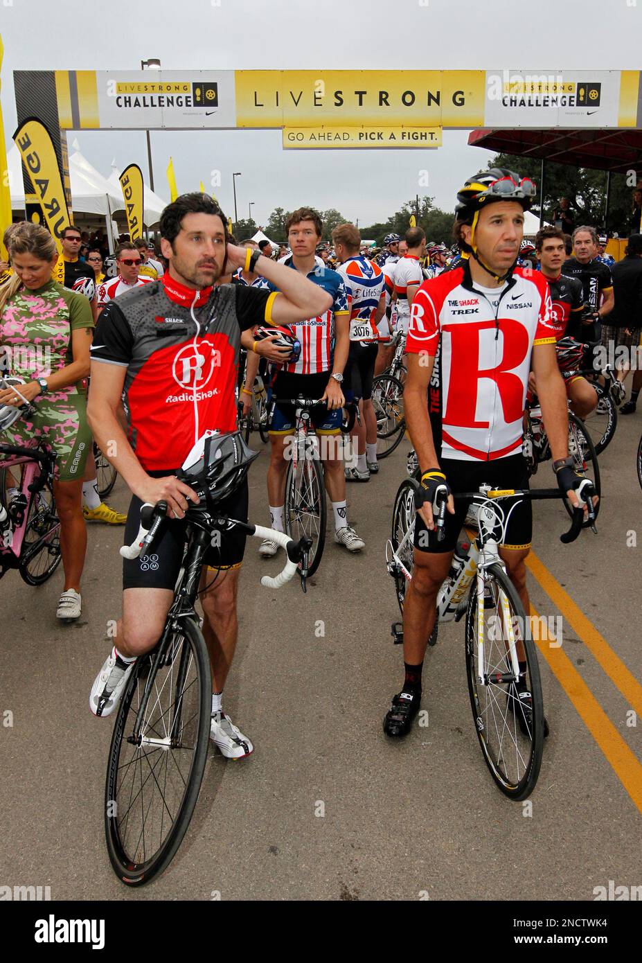 Actor Patrick Dempsey, left, captains Team RadioShack as he and Lance  Armstrong kick off the LIVESTRONG Challenge Ride in Austin, Texas.RadioShack  CMO Lee Applbaum at right.(Erich Schlegel/AP Images for RadioShack Stock  Photo -