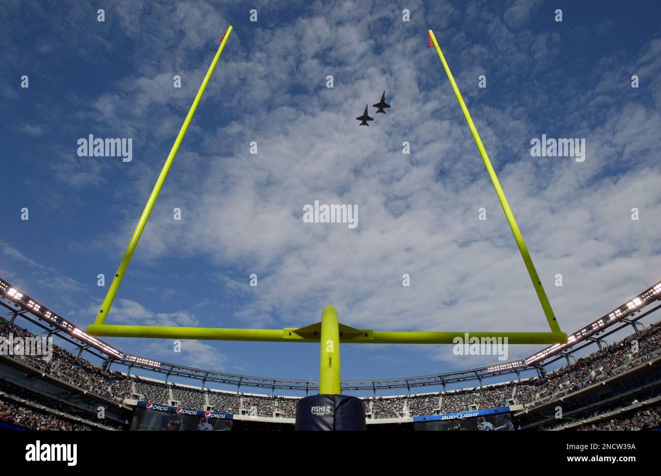 A Stealth bomber flies over Yankee Stadium prior to the start of