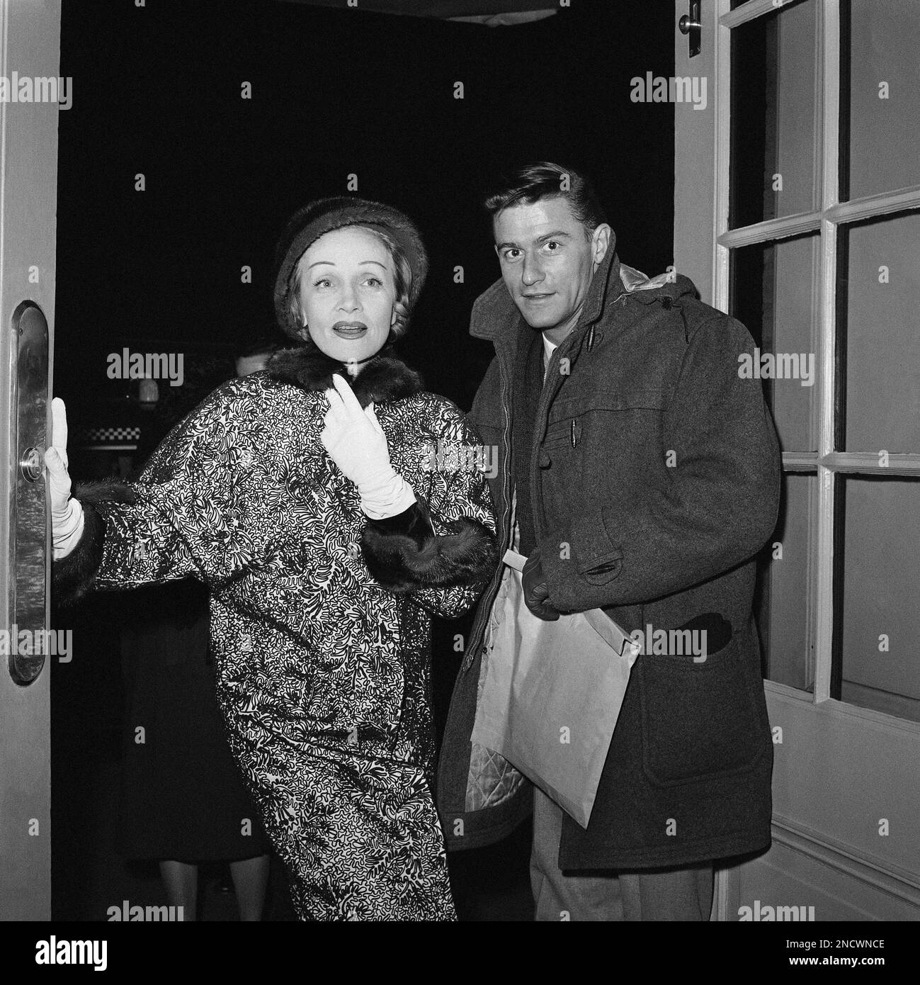 Marlene Dietrich and Roddy McDowall as they entered the Henry Miller ...