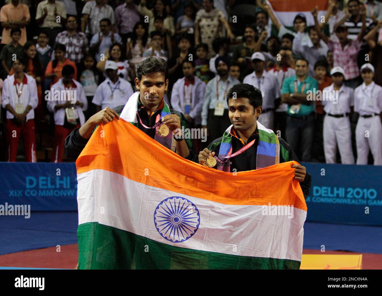 India's Sharath Kamal Achanta, left, and Subhajit Sahathe hold their
