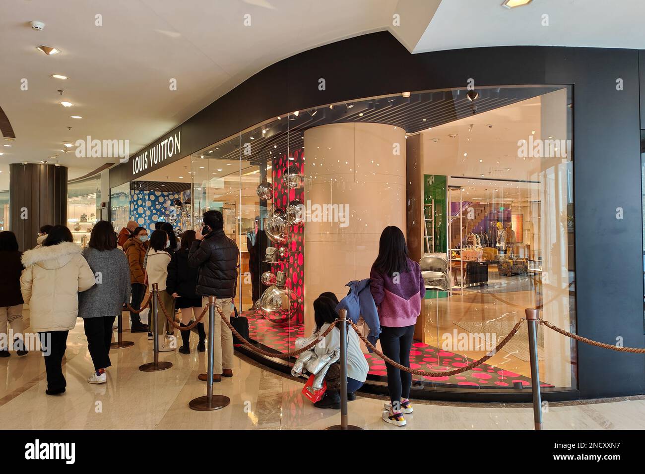 SHANGHAI, CHINA - FEBRUARY 15, 2023 - Customers line up in front of the Louis  Vuitton store at Huihenglong Plaza in Shanghai, China, on Feb 15, 2023.  Sources say Louis Vuitton may