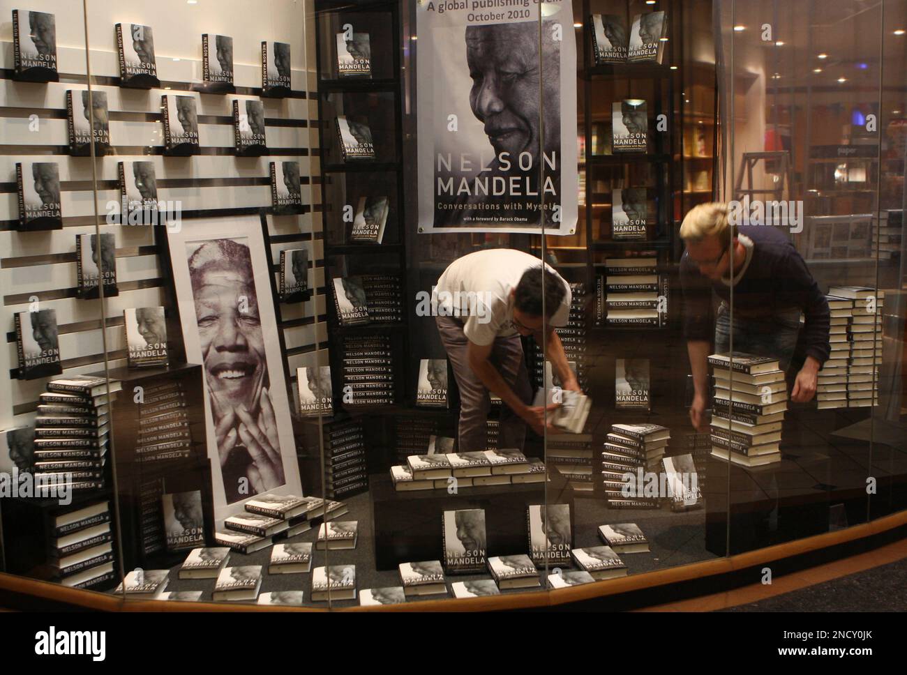 A bookstore window is prepared in Johannesburg Monday Oct. 11, 2010 for
