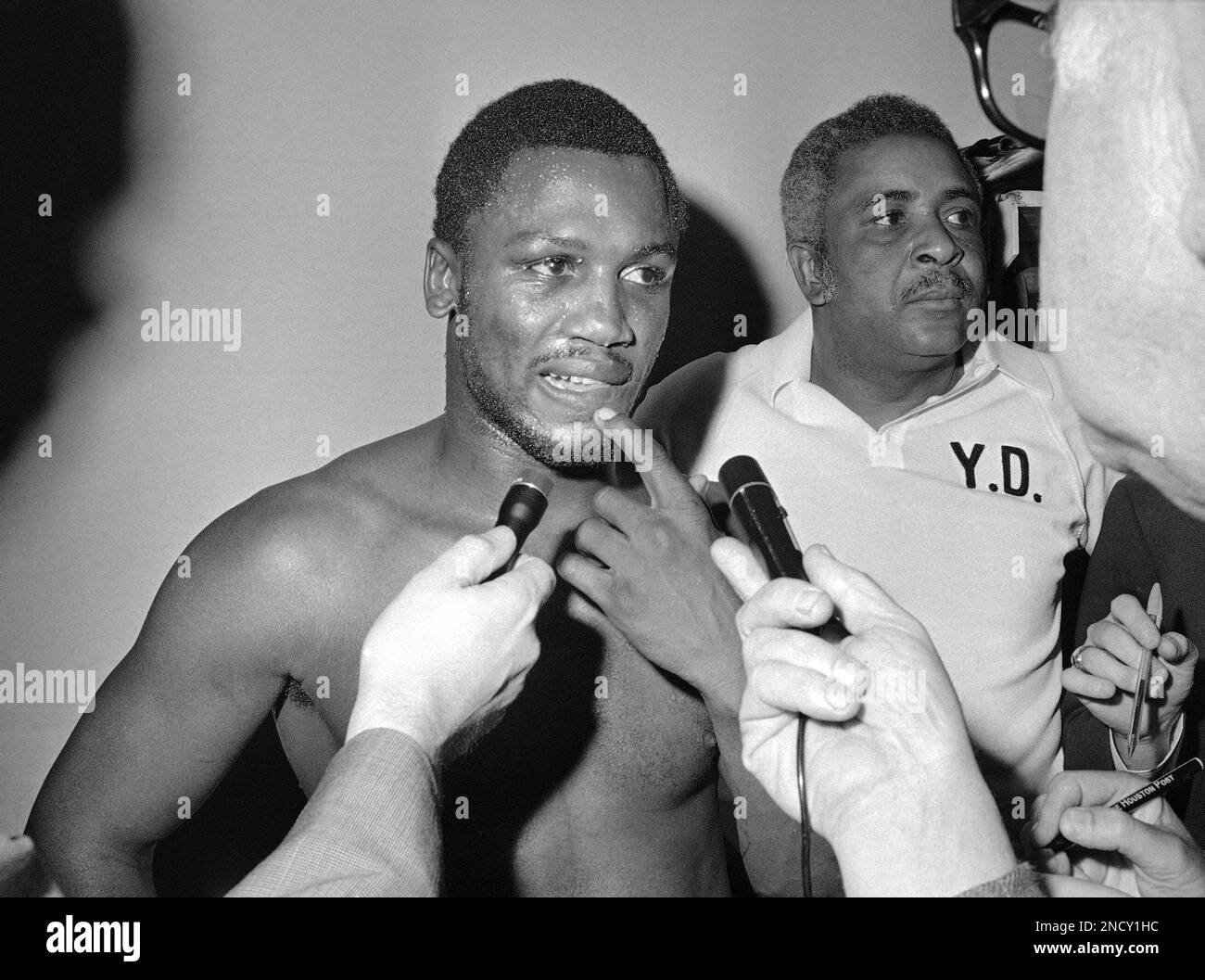 Heavyweight Champion Joe Frazier displays a small cut on his lower lip