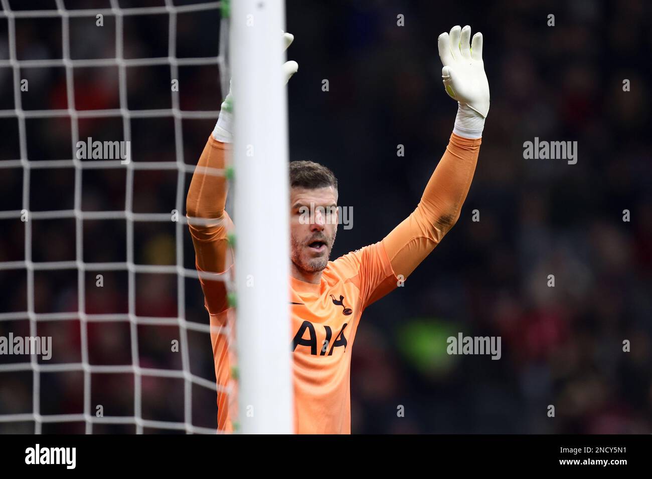 Fraser Forster of Tottenham Hotspur Fc gestures during the Uefa Champions League round of 16 first leg match between AC Milan and Tottenham Hotspur at Giuseppe Meazza Stadium on February 14, 2023 in Milan, Italy. Stock Photo