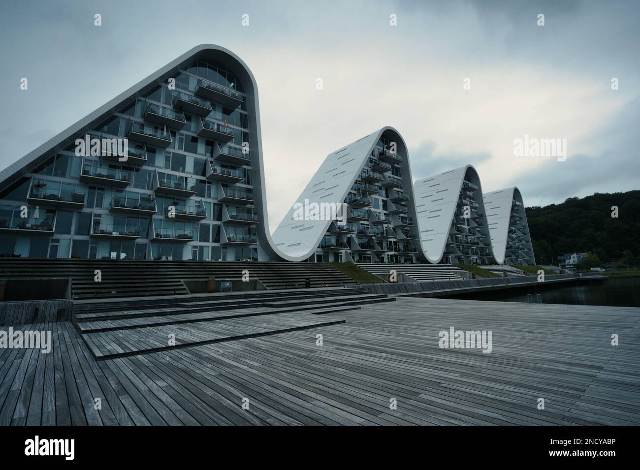 A low-angle of the wave houses in Vejle, Denmark, modern architecture ...