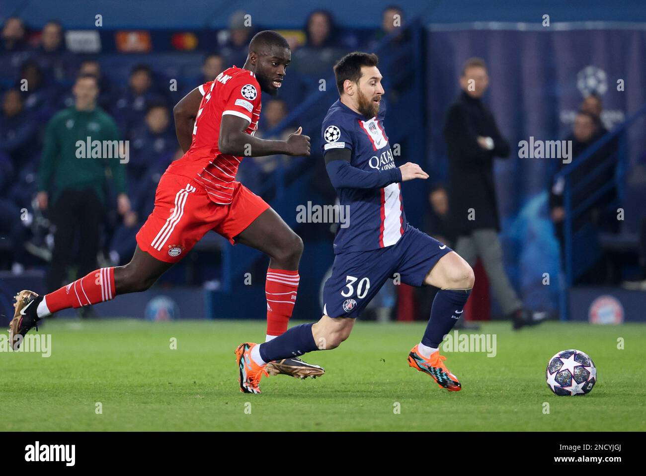 Lionel Messi of PSG, Dayot Upamecano of Bayern Munich (left) during the ...