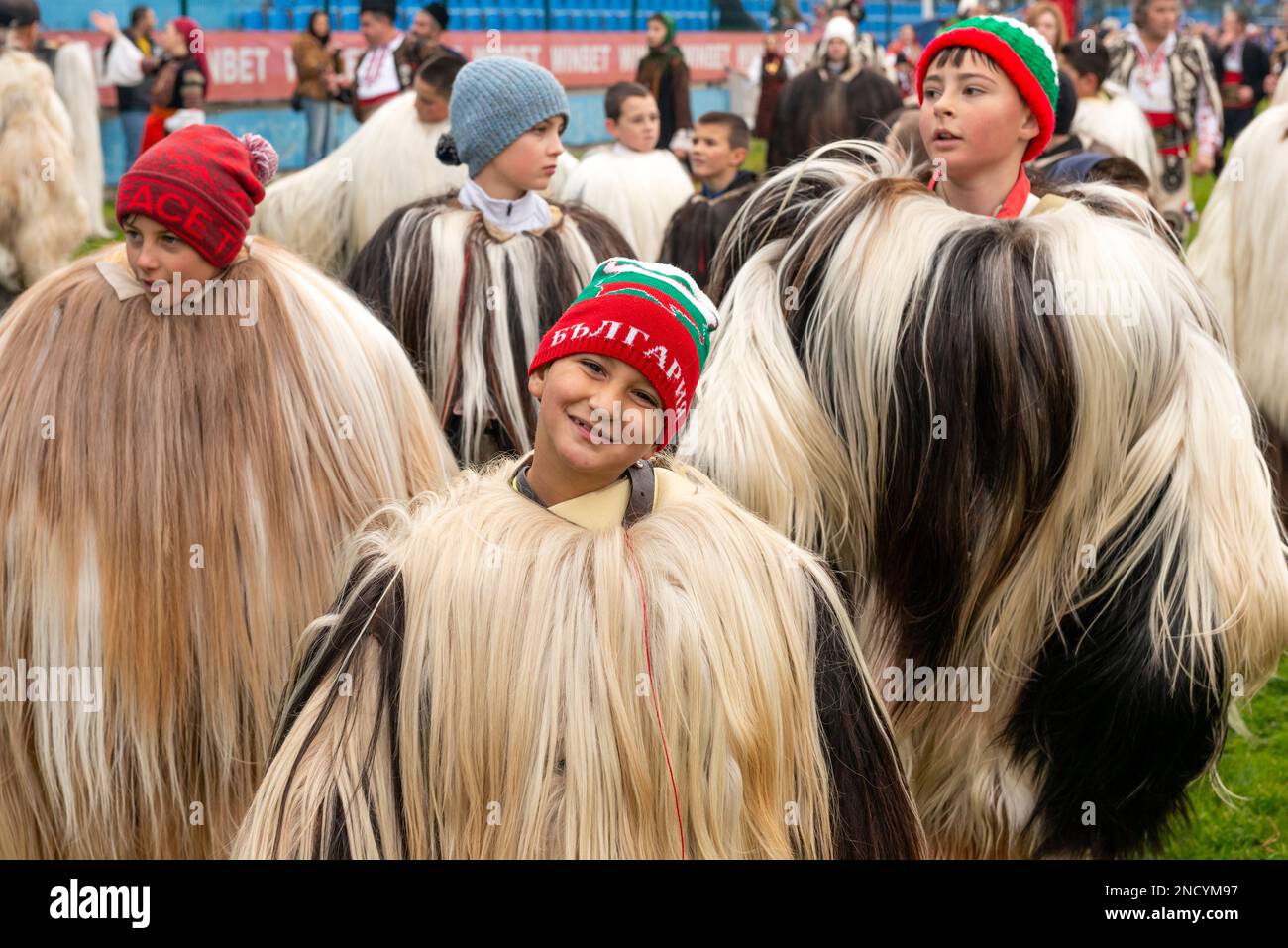 Young boys in Babugeri costumes made of goat's fur participating at the annual Kukeri festival Simitlia in Simitli, Bulgaria, Eastern Europe, Balkans Stock Photo