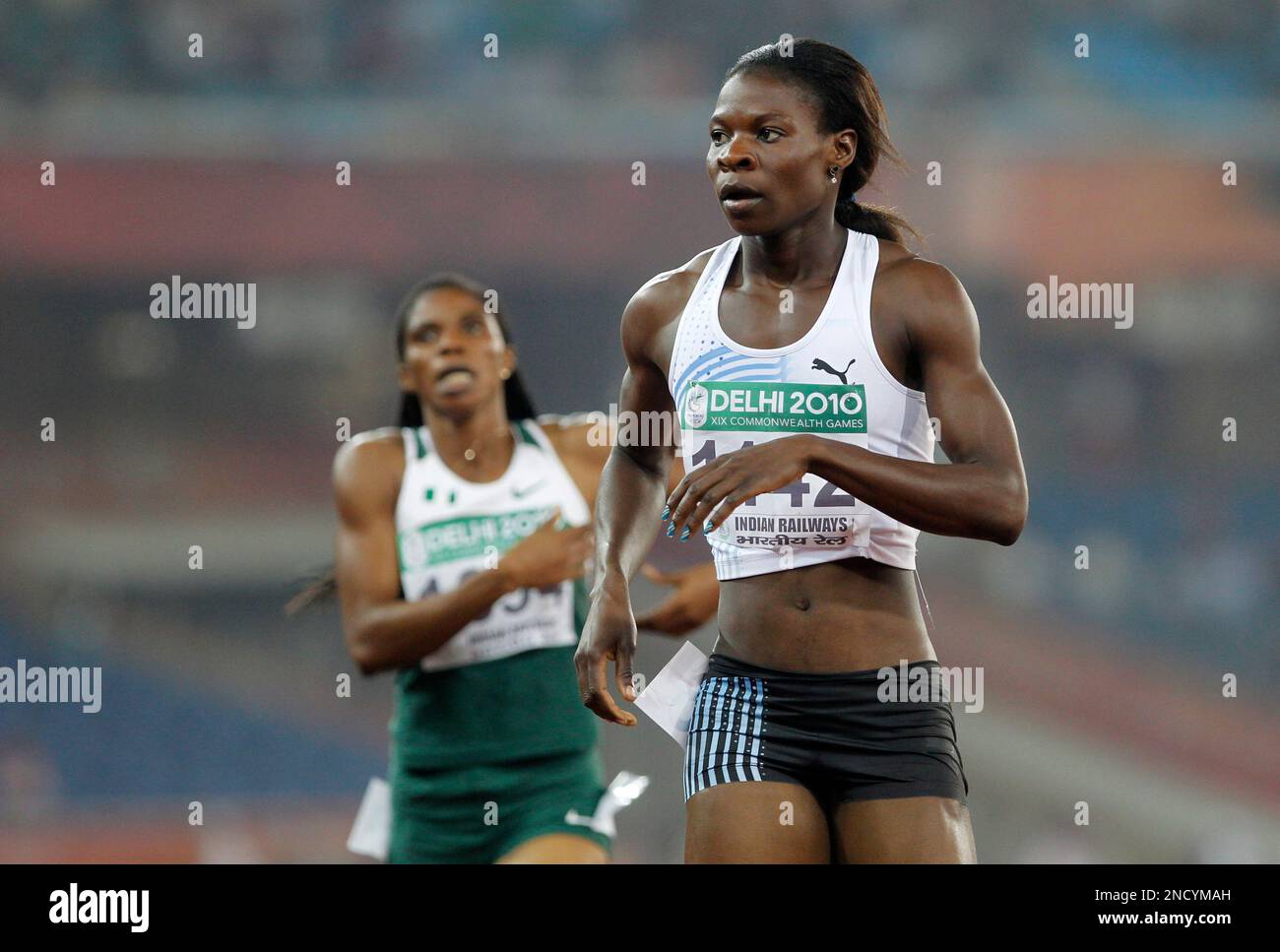 Botswana's Amantle Montsho, right, reacts after competing in the Women ...