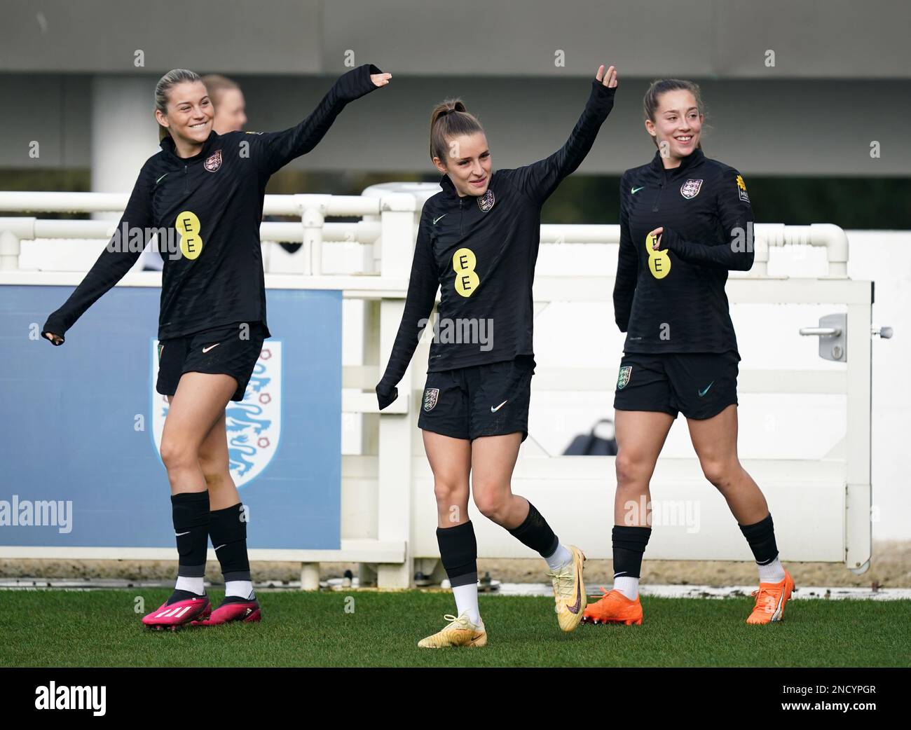 Left to right, England's Alessia Russo, Ella Toone and Maya Le Tissier walk out for a training session at St. George's Park, Burton upon Trent. Picture date: Wednesday February 15, 2023. Stock Photo