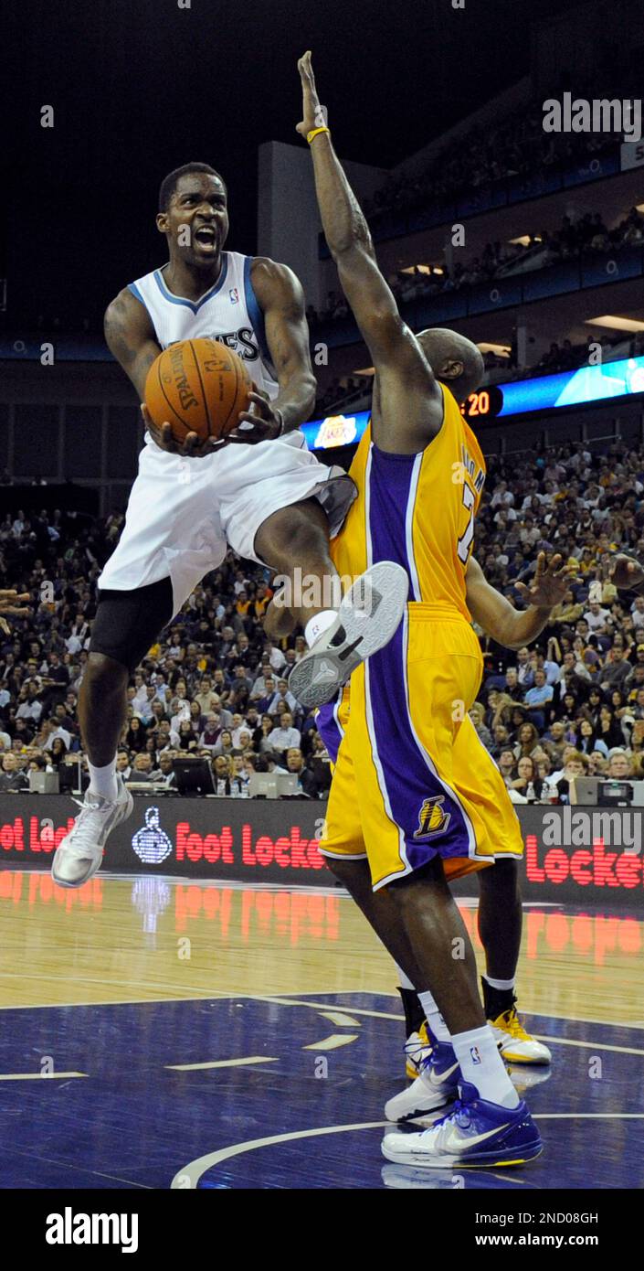 LA Lakers' Lamar Odom, right, stops Timberwolves' Martell Webster
