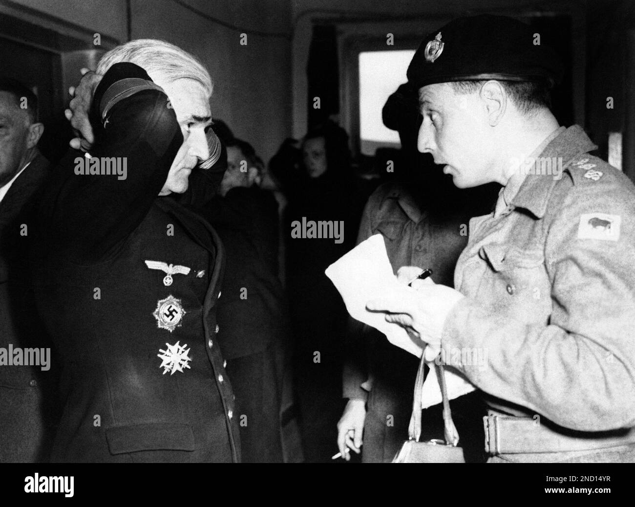 By order of the Supreme Commander, British troops arrested Grand