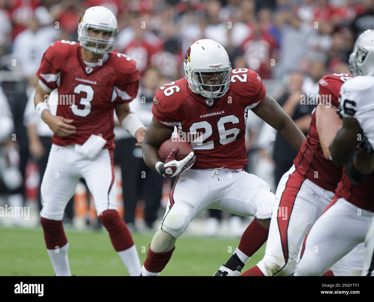 Arizona Cardinals running back Beanie Wells (26) runs against the Oakland  Raiders during the second quarter of an NFL football game Sunday, Sept. 26,  2010, in Glendale, Ariz. (AP Photo/Paul Connors Stock