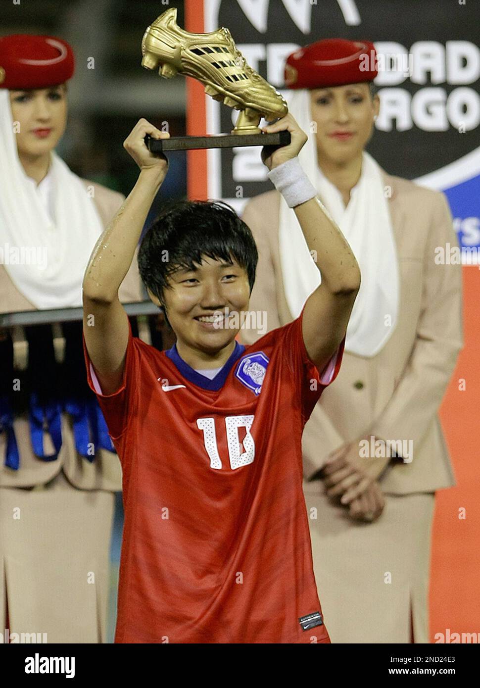 Golden Boot winner Yeo Min Ji, of South Korea, holds up her trophy for