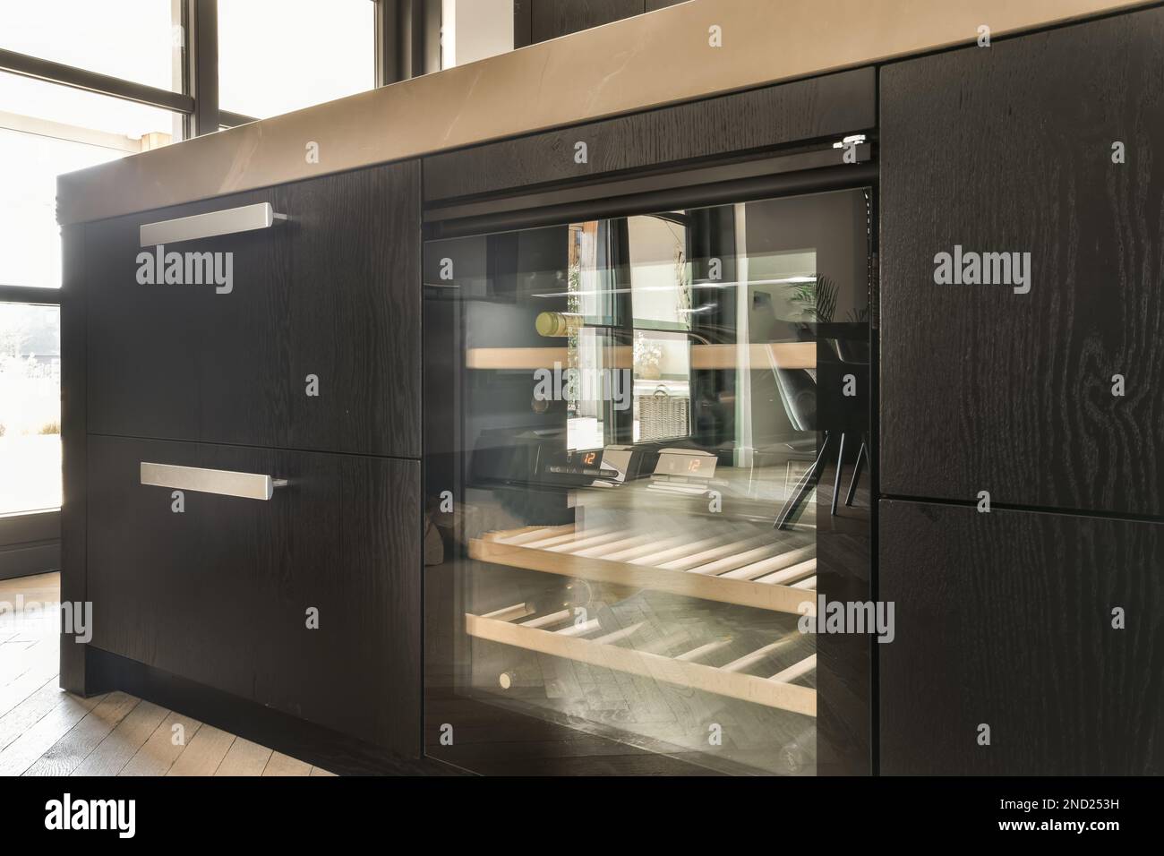 Modern countertop with wooden black and built in wine fridge