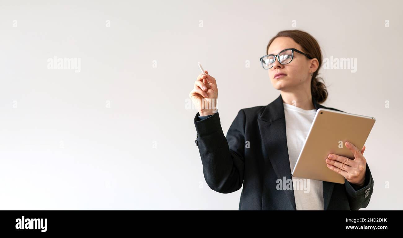 Defocused female business person working with virtual interface using digital smart pen. Stock Photo