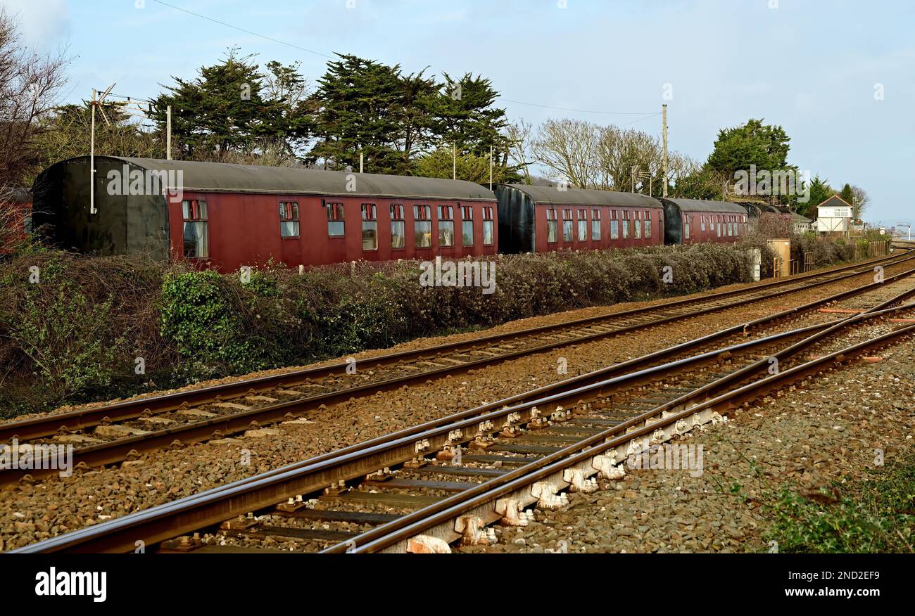 Camping coaches beside the main railway line at Dawlish Warren, South Devon. Stock Photo