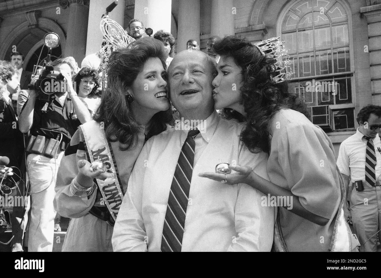 Mayor Edward I. Koch gets kisses from the newly-crowned Miss Universe ...