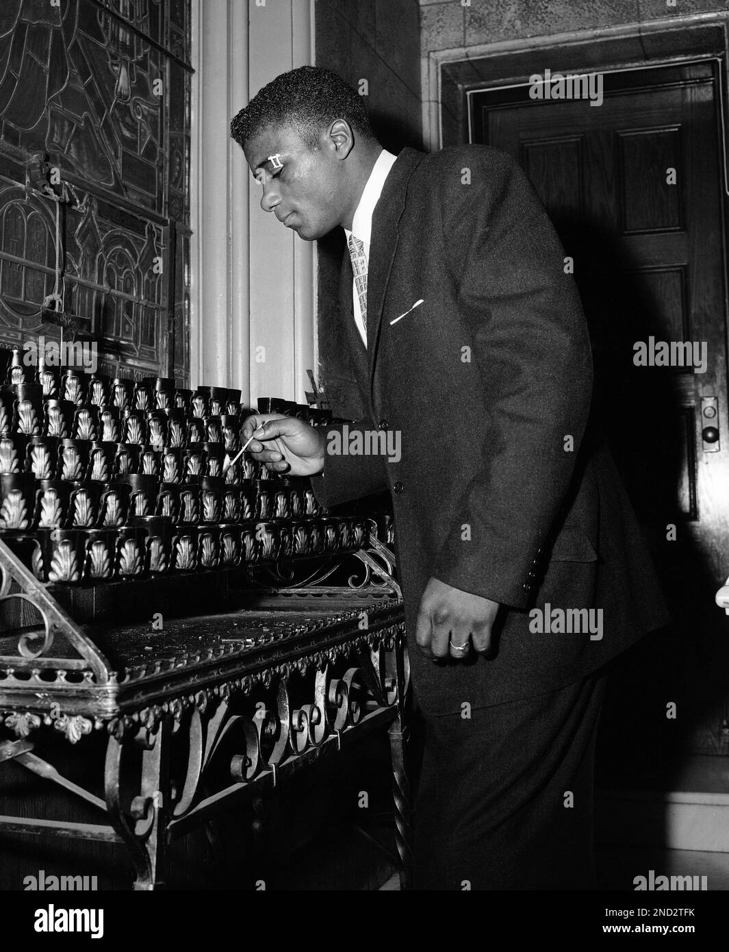 Floyd Patterson, new heavyweight champion of the boxing world, puts