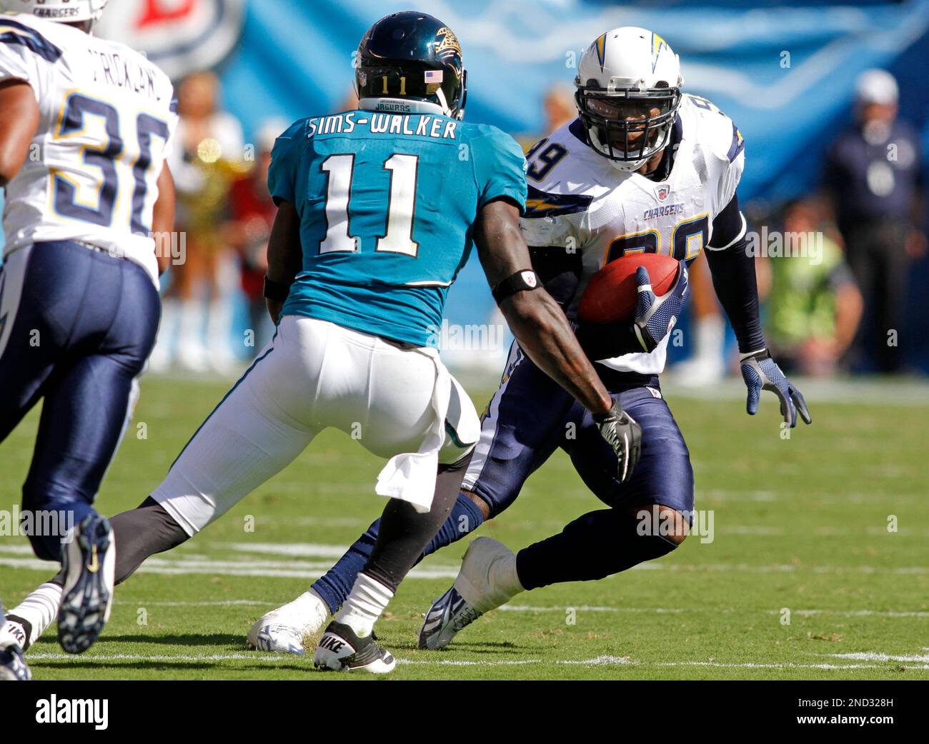 San Diego Chargers linebacker Kevin Burnett, right, runs for