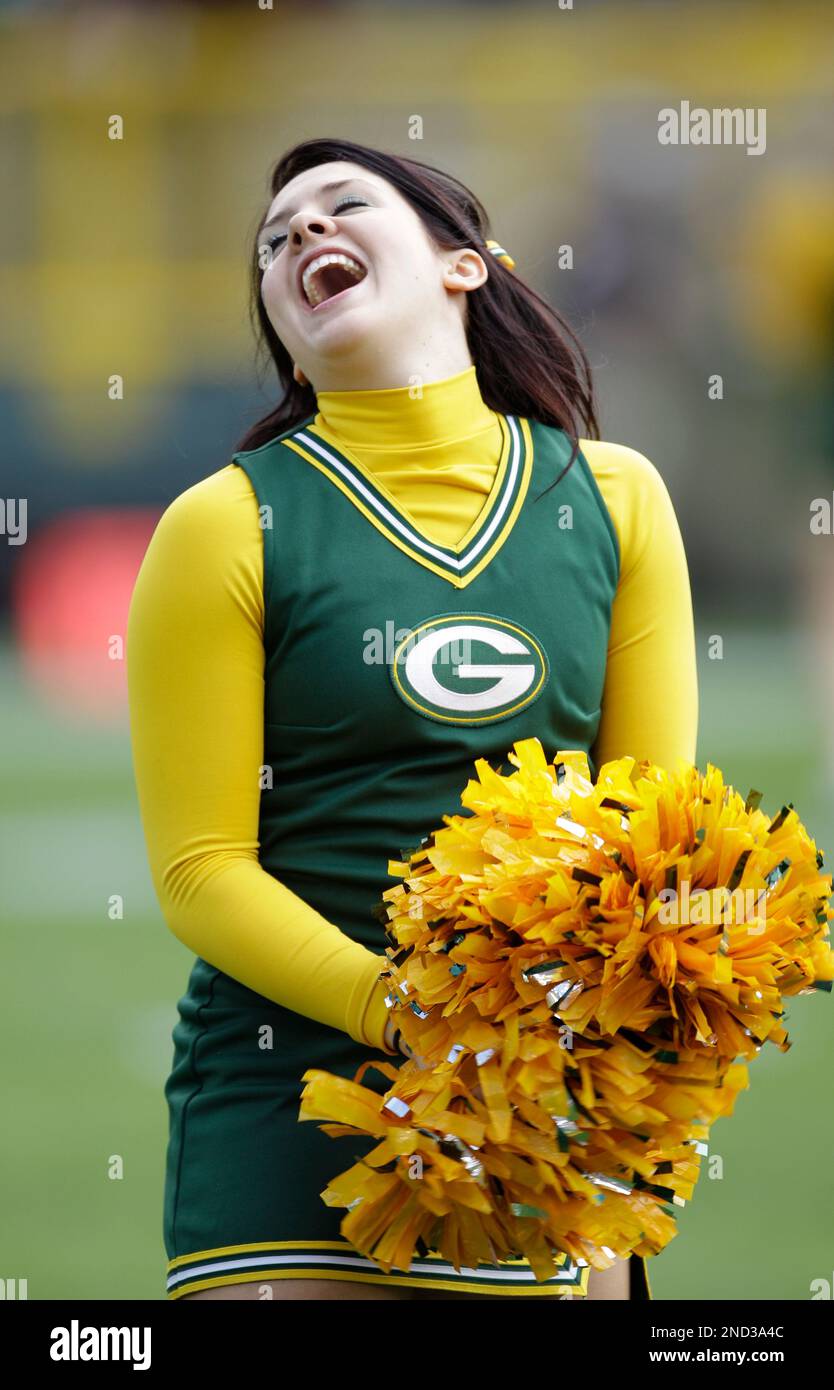 A Green Bay Packers cheerleader is seen before an NFL football