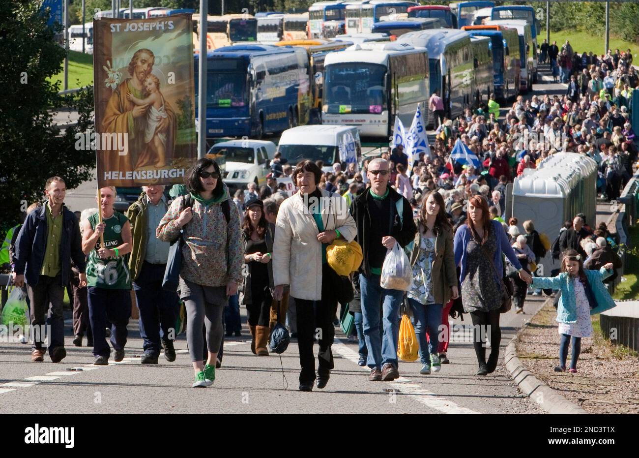 Pilgrims Depart From Buses Parked On The M77 Motorway As They Arrive At pilgrims-depart-from-buses-parked-on-the-m77-motorway-as-they-arrive-at