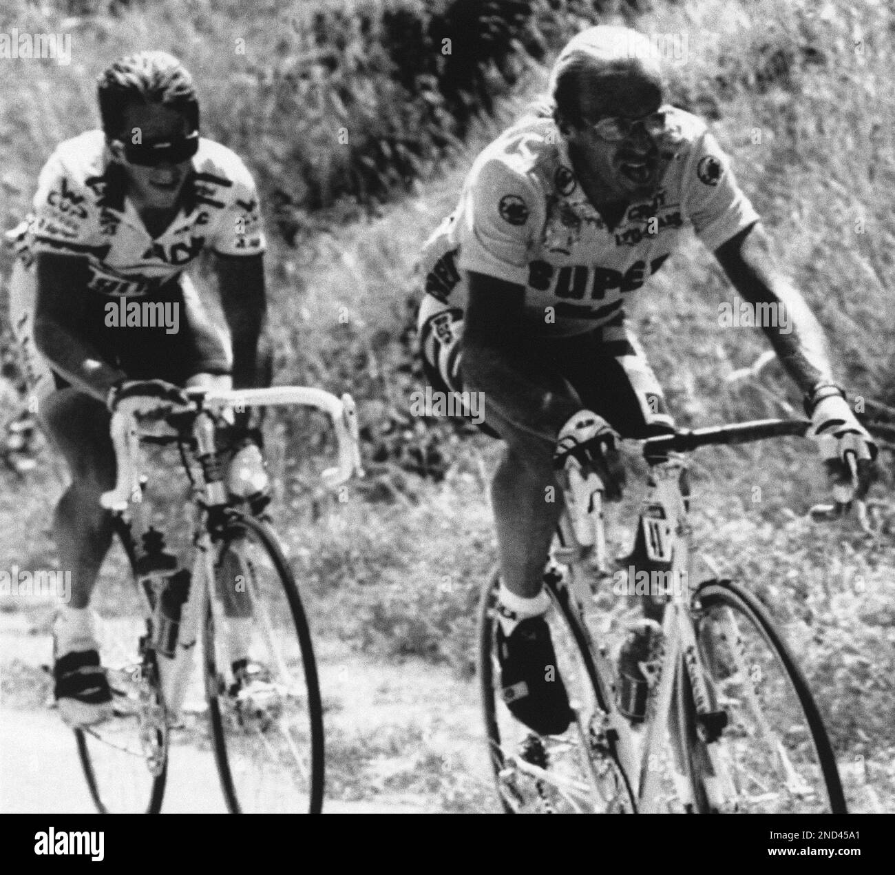 Laurent Fignon of France, right, leads Greg LeMond of the United States ...