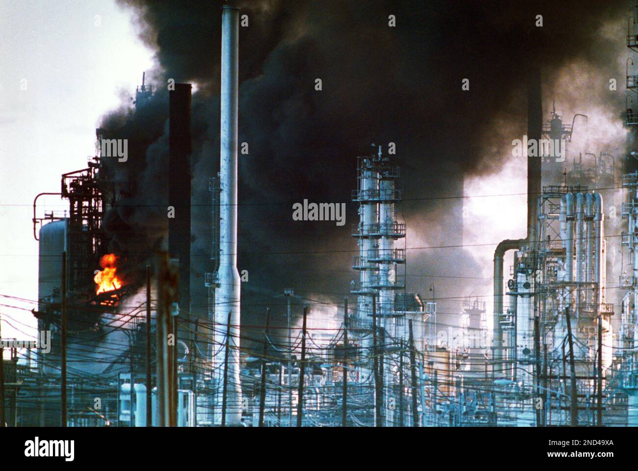 Smoke billows from a catalytic cracker at the Shell Oil Company