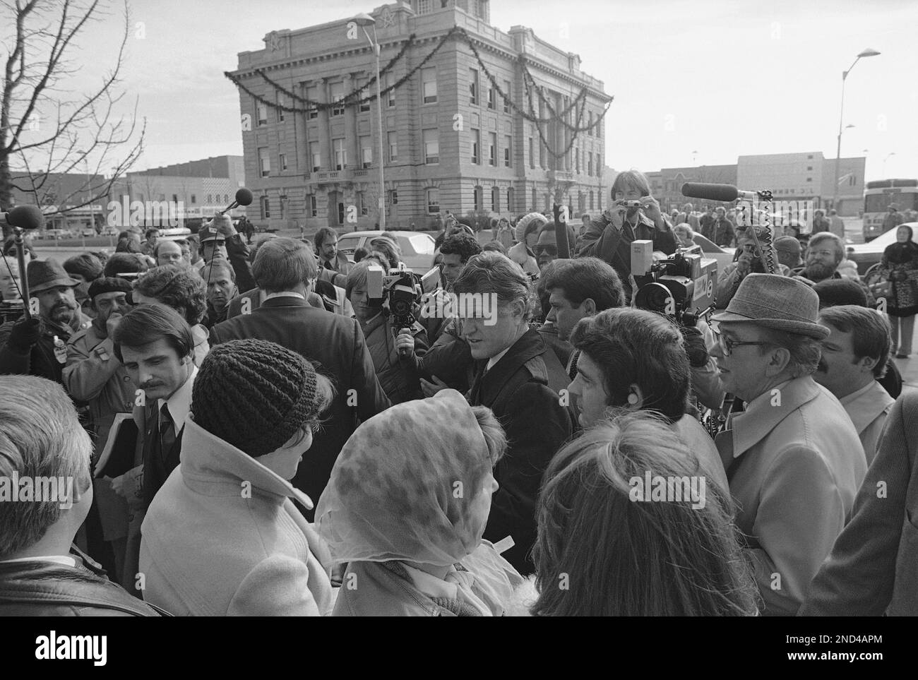 Sen. Edward Kennedy, center, as he walked around the town square of