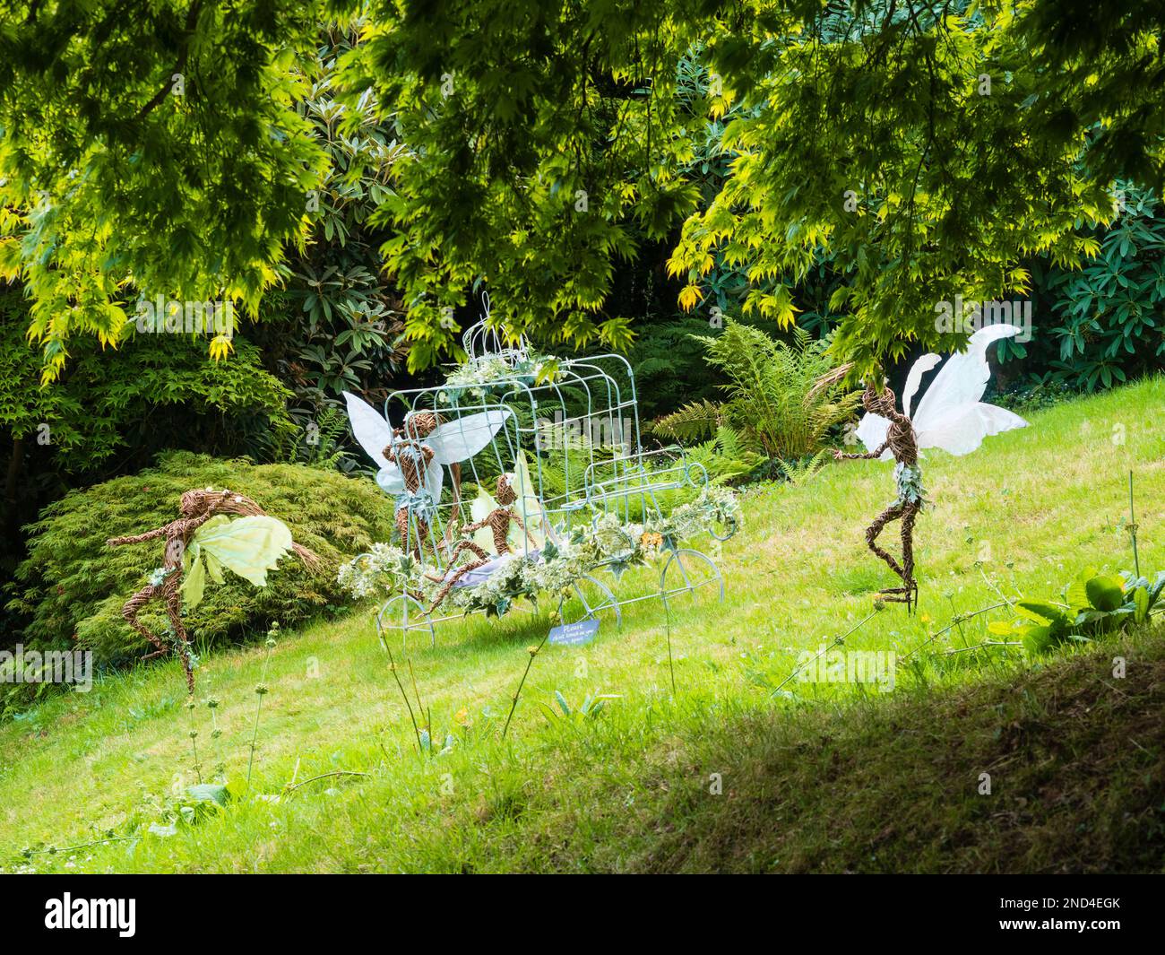 Wicker garden sculptures in the Fairy-Trails exhibit at The Garden House, Buckland Monachorum, Devon, UK, summer 2022 Stock Photo
