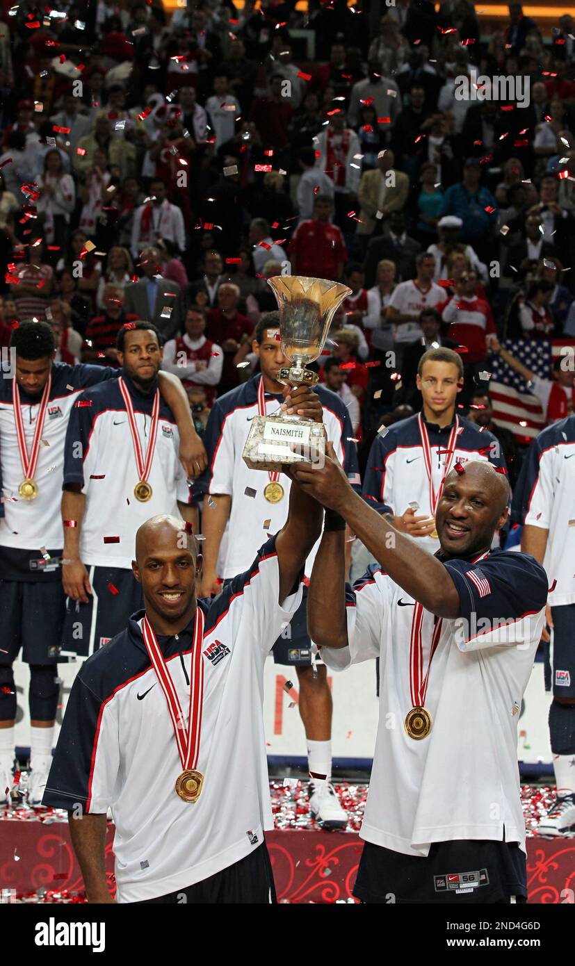 USA's Lamar Odom, right, and Chauncey Billups hold the trophy after the  final of the World Basketball Championship between Turkey and the USA,  Sunday, Sept. 12, 2010, in Istanbul. USA won the