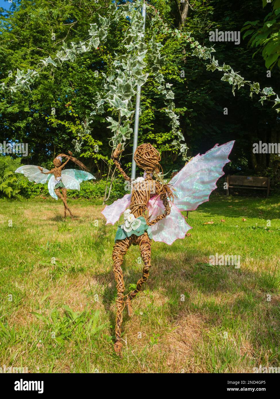 Wicker garden sculptures in the Fairy-Trails exhibit at The Garden House, Buckland Monachorum, Devon, UK, summer 2022 Stock Photo