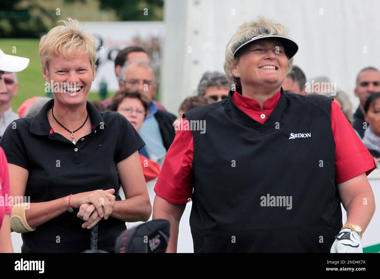 Trish Johnson, left, and Laura Davies, right, of England joke prior to the  beginning of the final round of the Women's French Open Golf at Baillet en  France, north of Paris, Sunday
