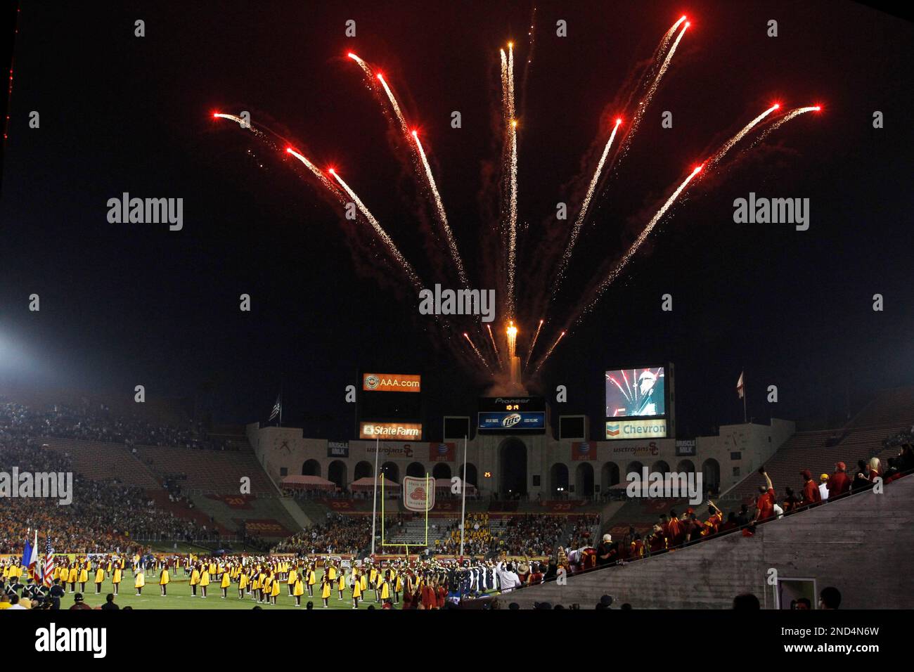 Fireworks explode over the Los Angeles Memorial Coliseum before Southern California faces